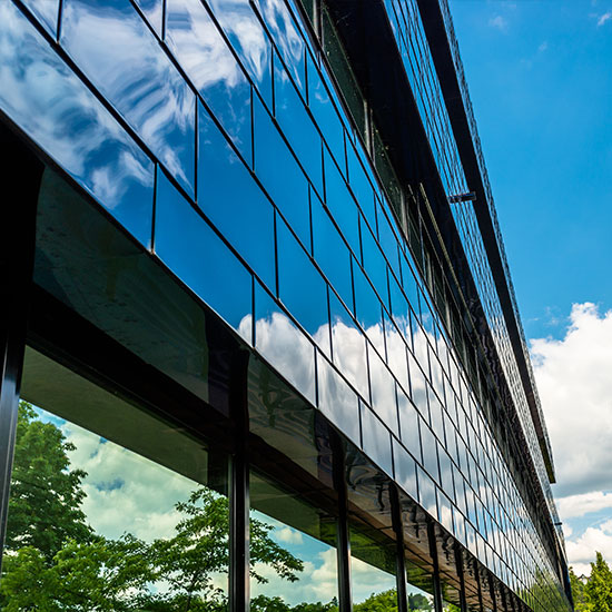 commercial building that's been tinted to help save on energy and other benefits